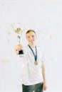 Woman in White Dress Holding a Wine Glass