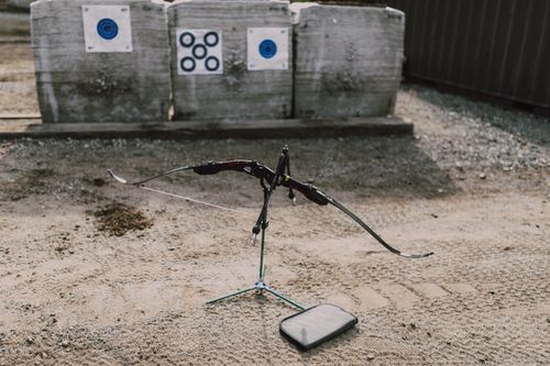 Free Traditional archery setup with bow and targets at an outdoor range, perfect for practice. Stock Photo