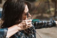 Woman Holding a Bow and Arrow
