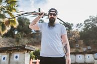 Man Holding a Recurve Bow