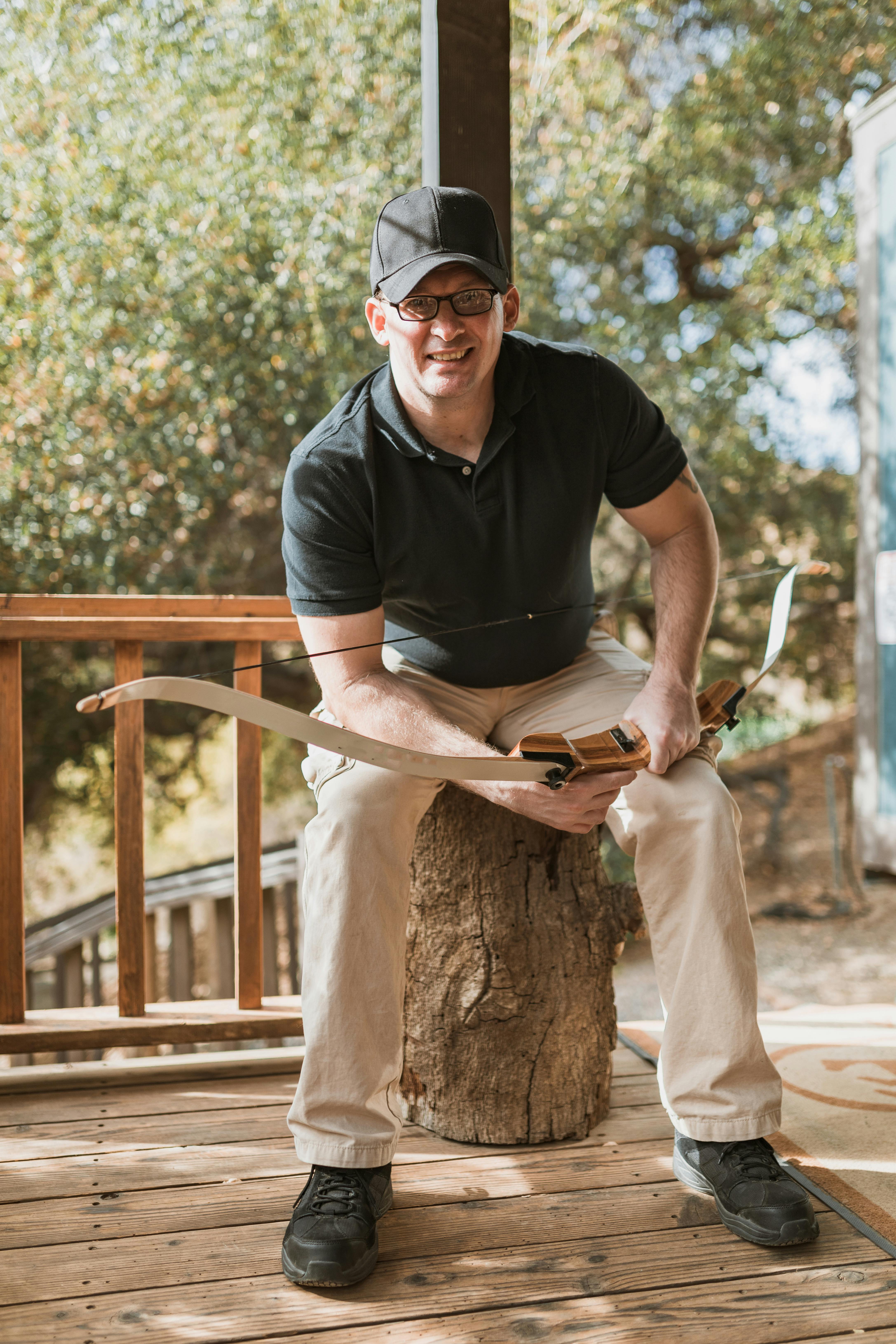 a man holding a bow