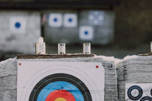 Free Steel Cans on Top of Archery Target  Stock Photo