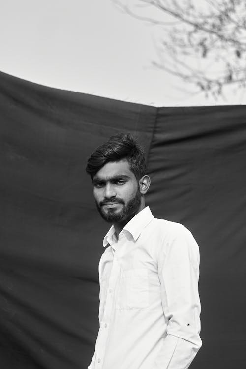 Grayscale Photo of a Bearded Man