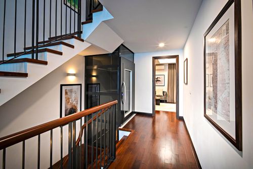 Brown Wooden Staircase With Brass Chandelier · Free Stock Photo