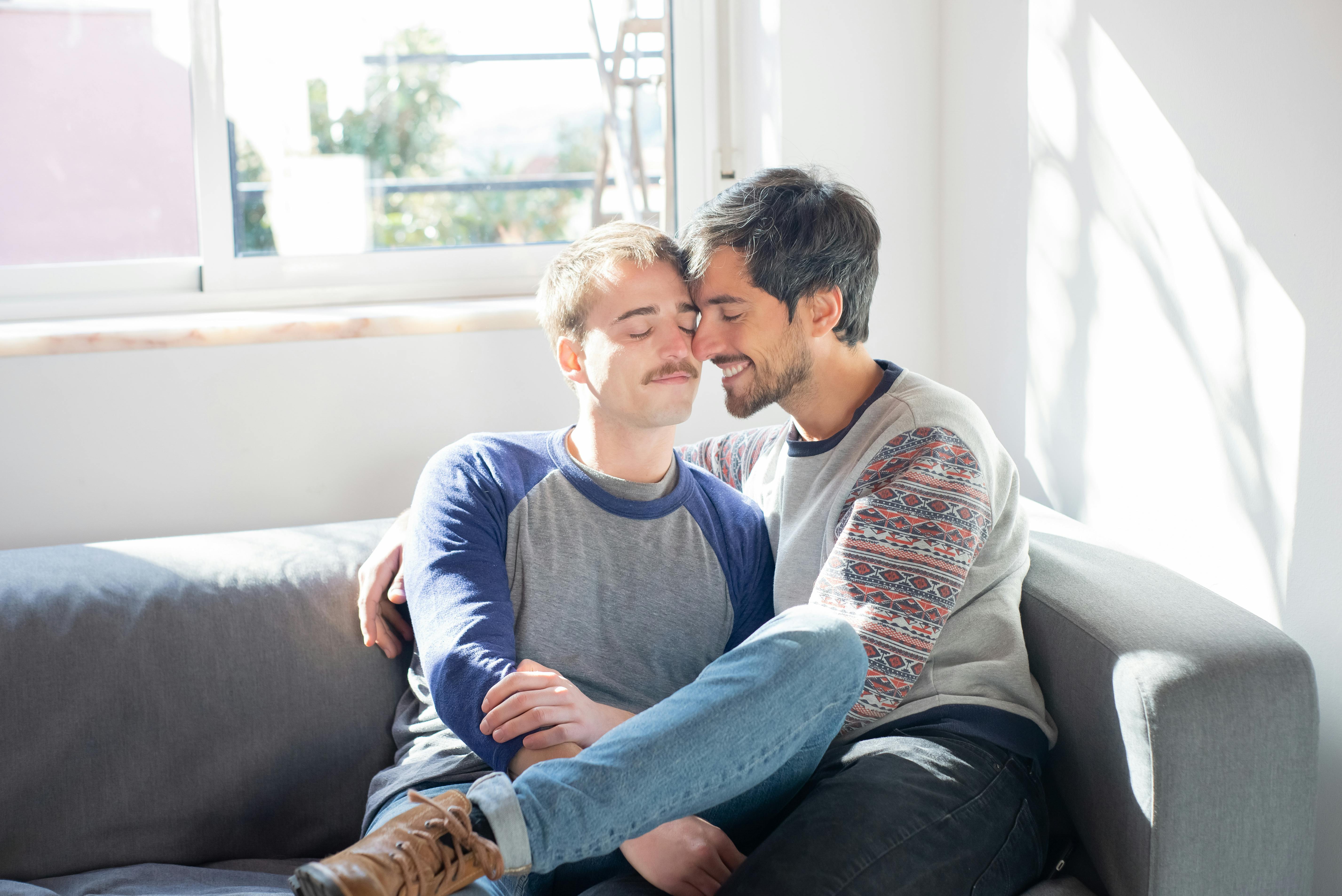 a couple sitting on the couch