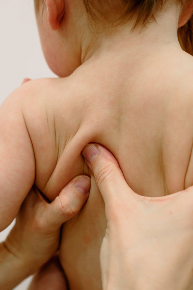 Baby Having A Back Massage