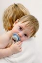 Cute Baby Sucking a Pacifier
