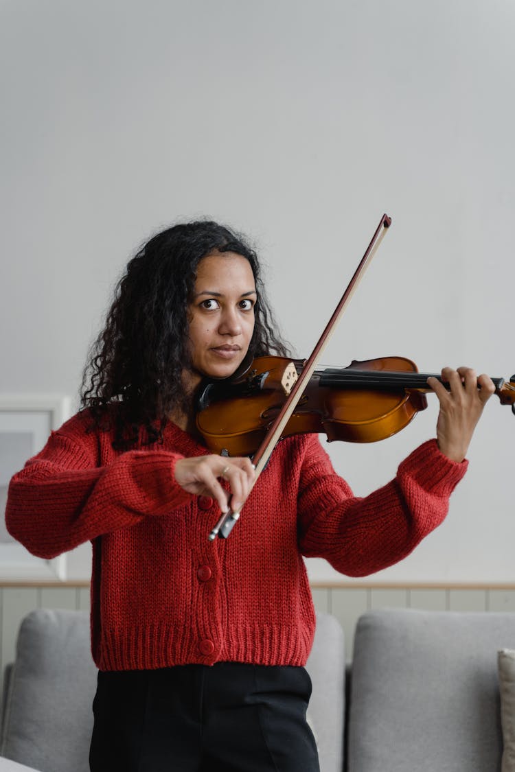 A Woman Playing The Violin