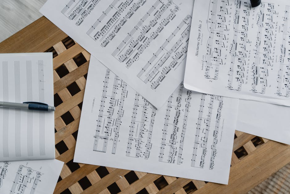Sheet Music on Wooden Surface 