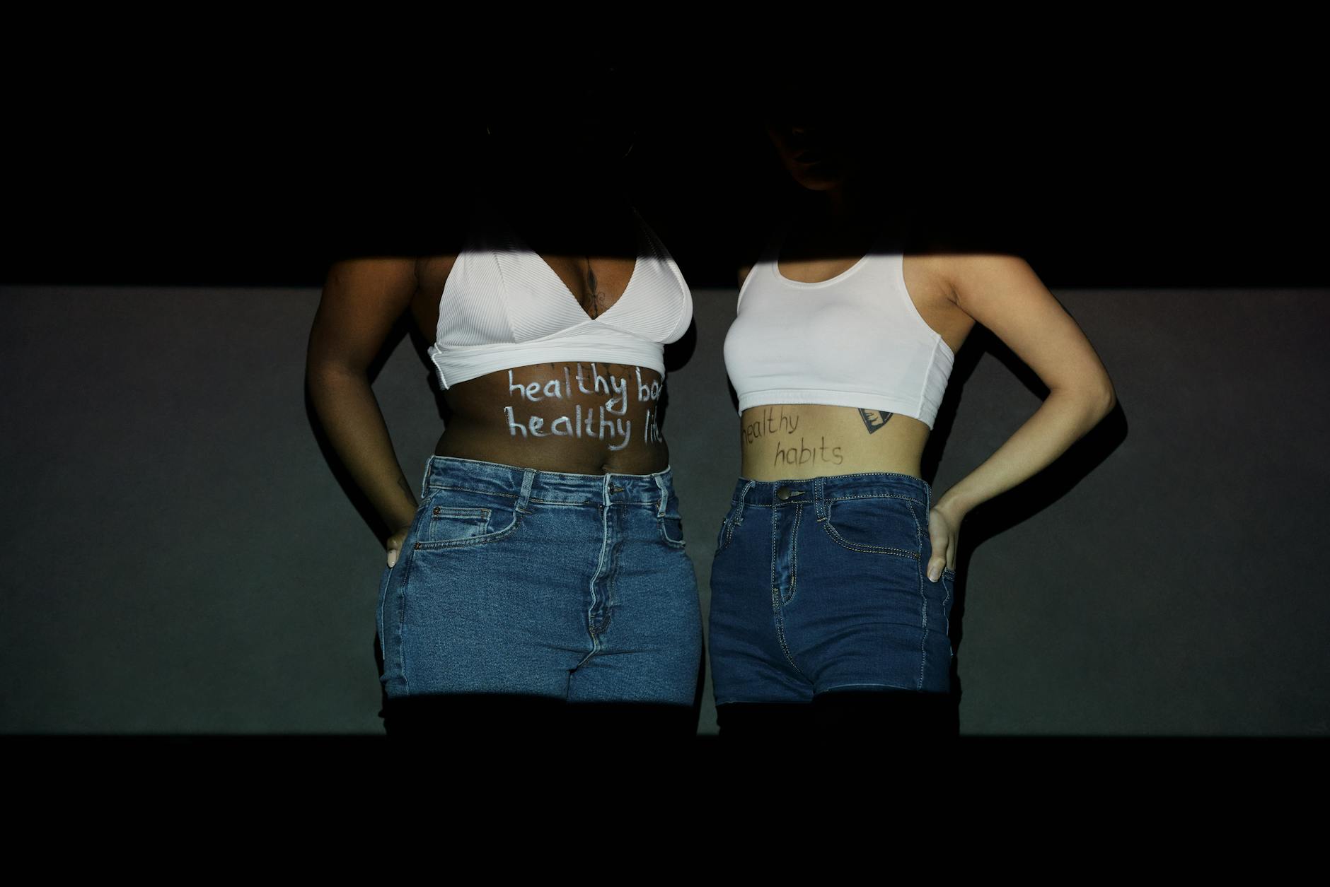 Women in Denim Jeans and White Crop Top