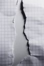 Torn paper with uneven edges on white background
