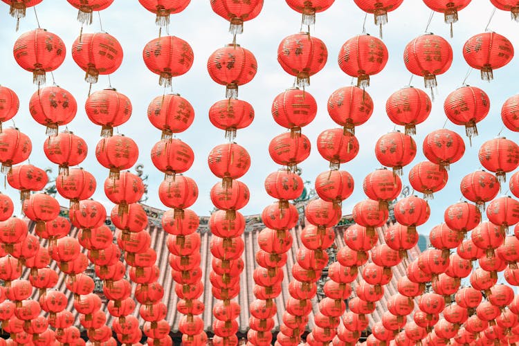 Red Chinese Lanterns Hanging In Rows