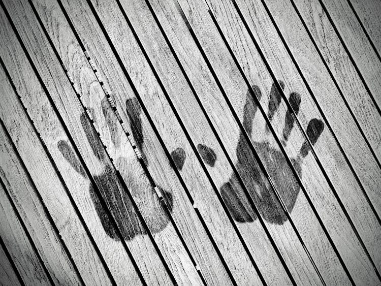 Handprints On Wooden Slats