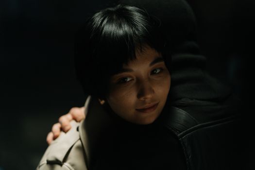 Photo Of A Woman Being Hugged