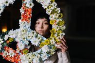 Woman Behind A Peace Sign