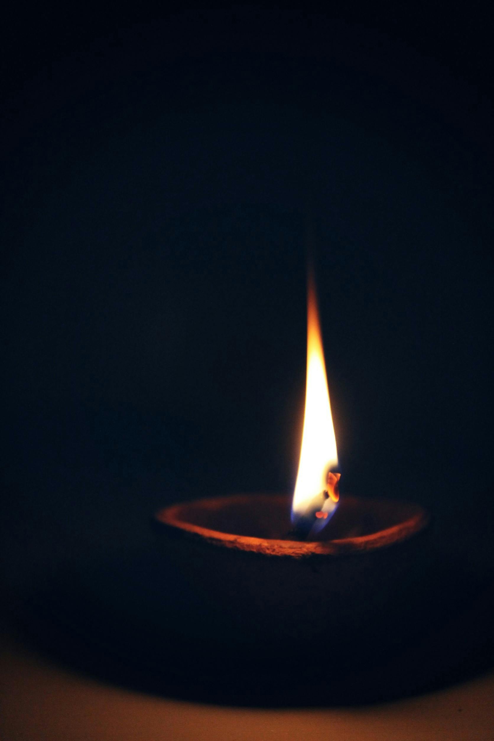 Lighted Candle 4K wallpaper download