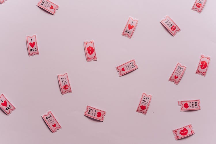 Pink Coupons On Pink Surface