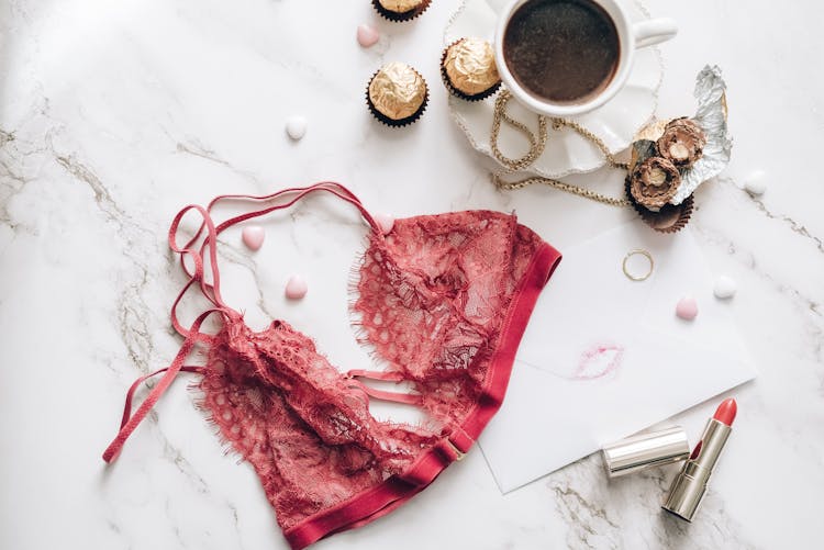 Lace Bra Chocolate And Lipstick On Flatlay Photography