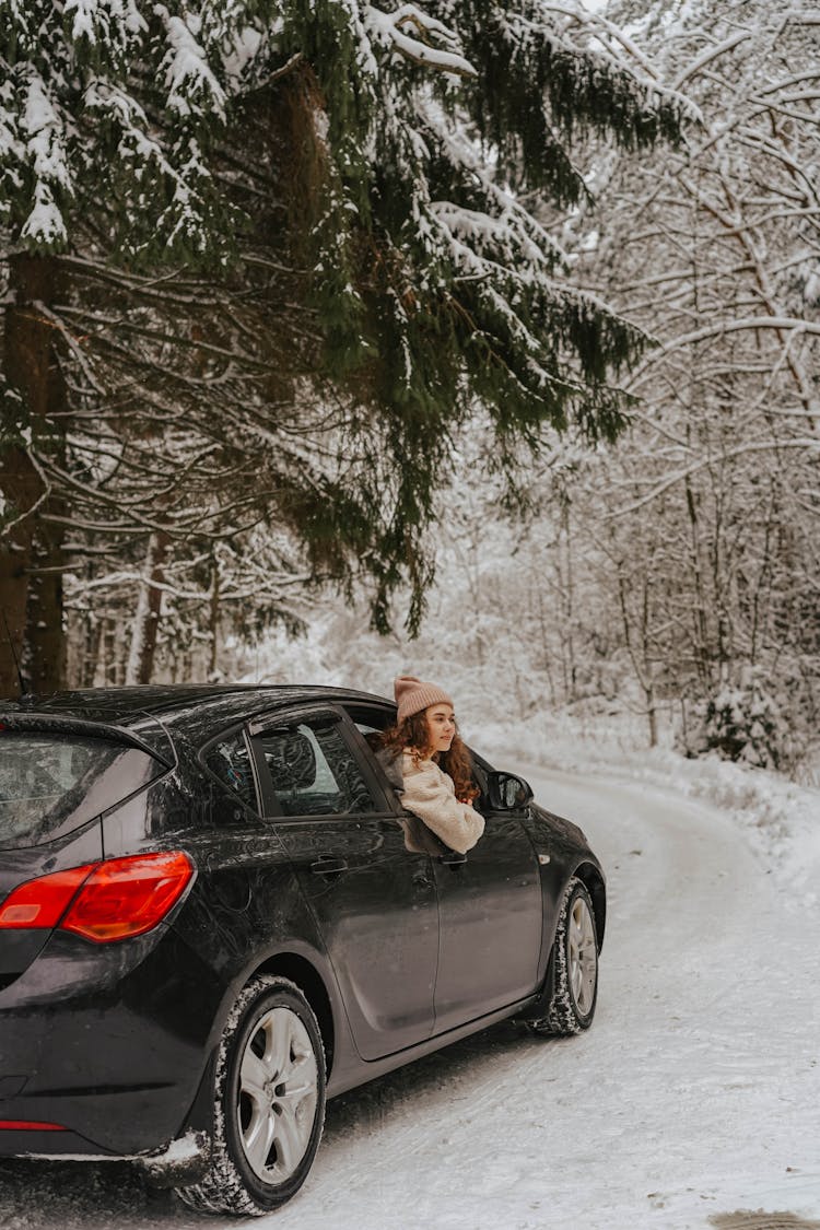 Black Car On Snowy Road