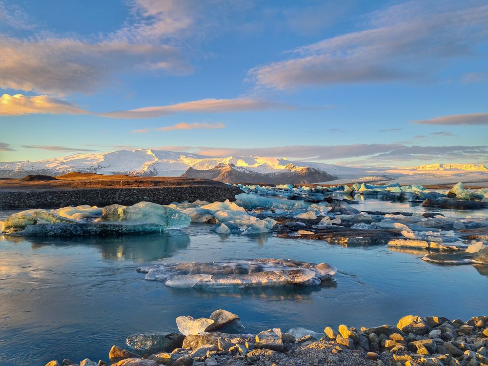 Ice In Rocks Rocks and Ice in Water · Free Stock Photo