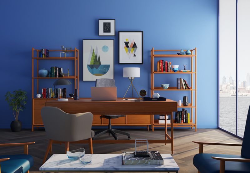 dusty blue office wall with white trim