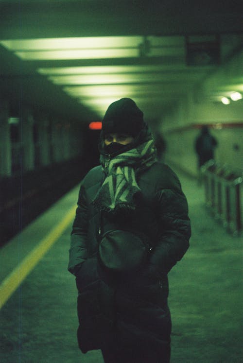 Shallow Focus Photo of Person Wearing Black Winter Clothes