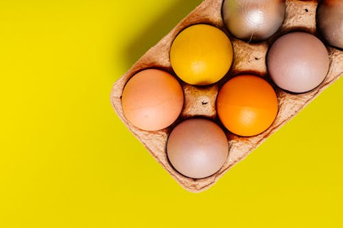 Free Painted Eggs on the Carton Box Stock Photo