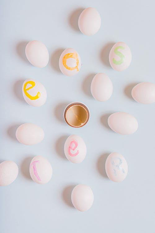 Letters Painted on White Eggs