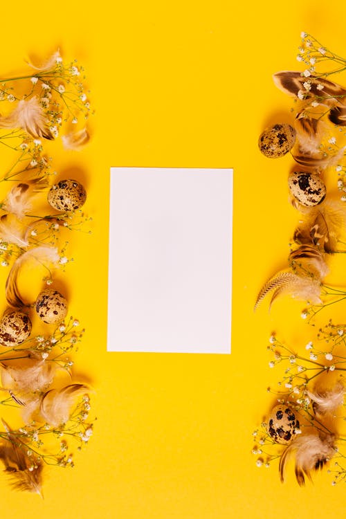 A Blank Paper on a Yellow Surface