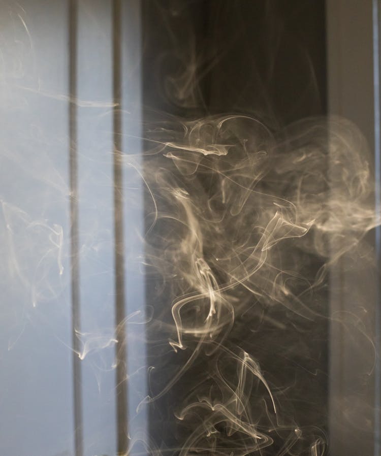 Toxic Cigarette Smoke In Dark Room