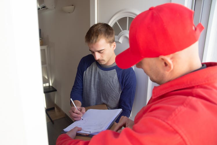 
A Man Receiving A Package