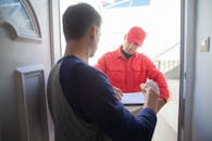 A Man Receiving a Package