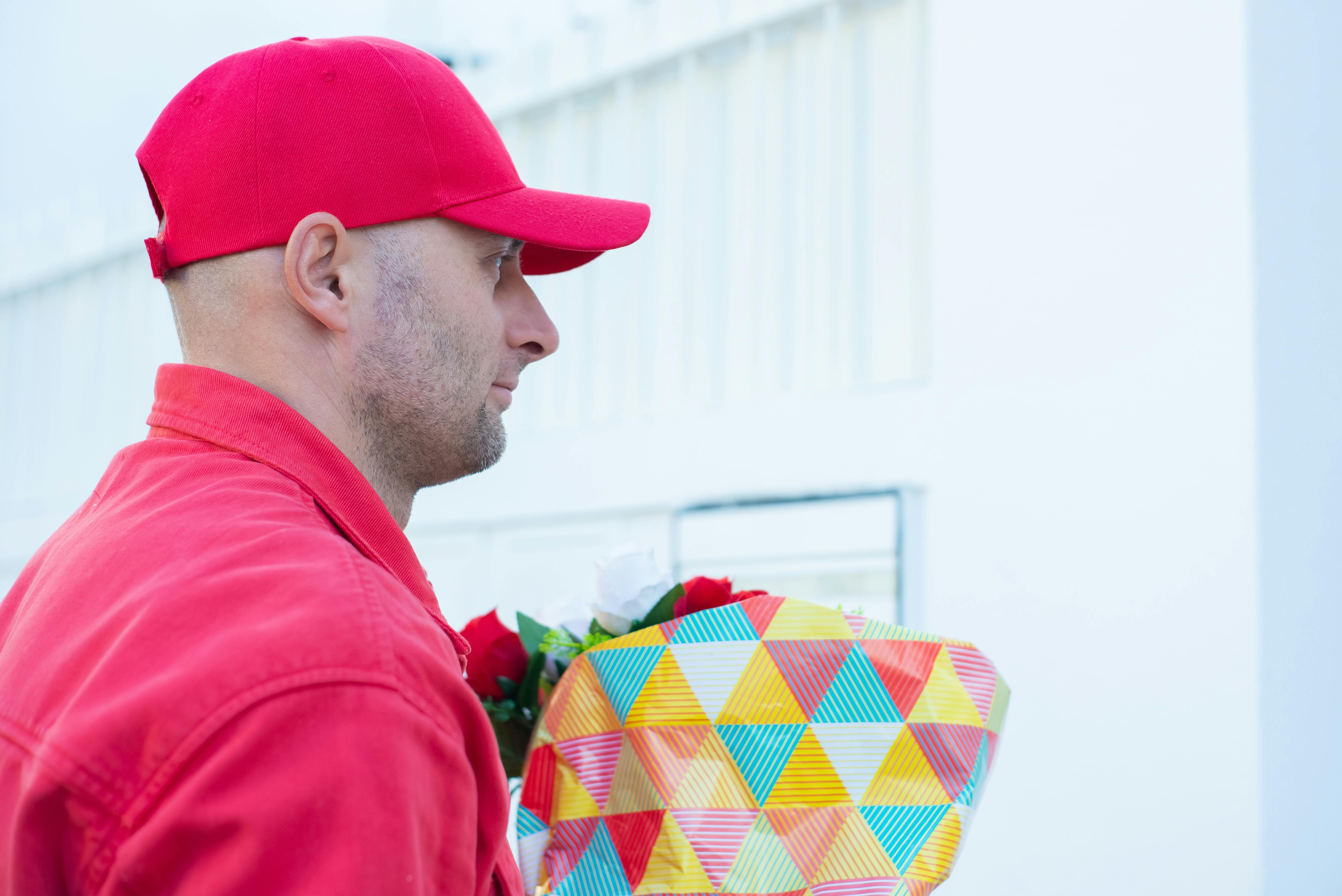 Free Photos - This Stock Photo Depicts Two Men Wearing Hats And Working  Together In A Field, Tending To A Beautiful Field Of Flowers, Likely Roses.  They Are Using A Plow To