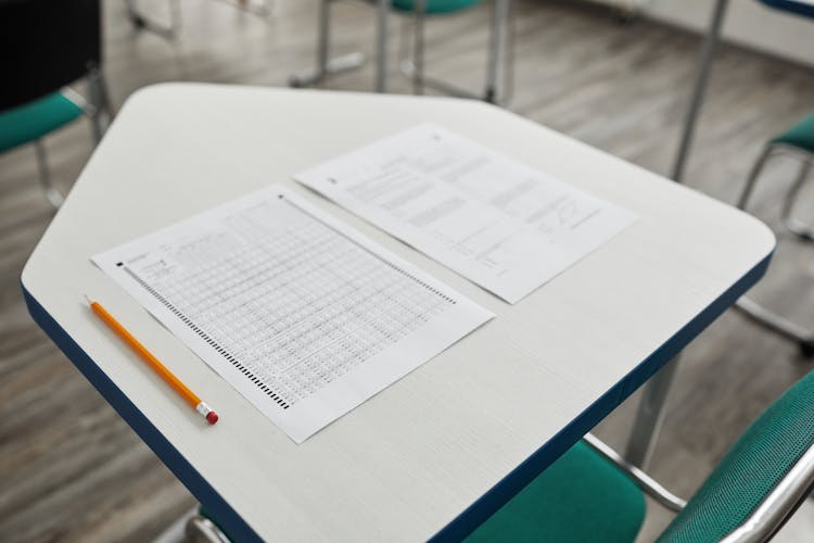 Test Papers And Pencil On The Desk