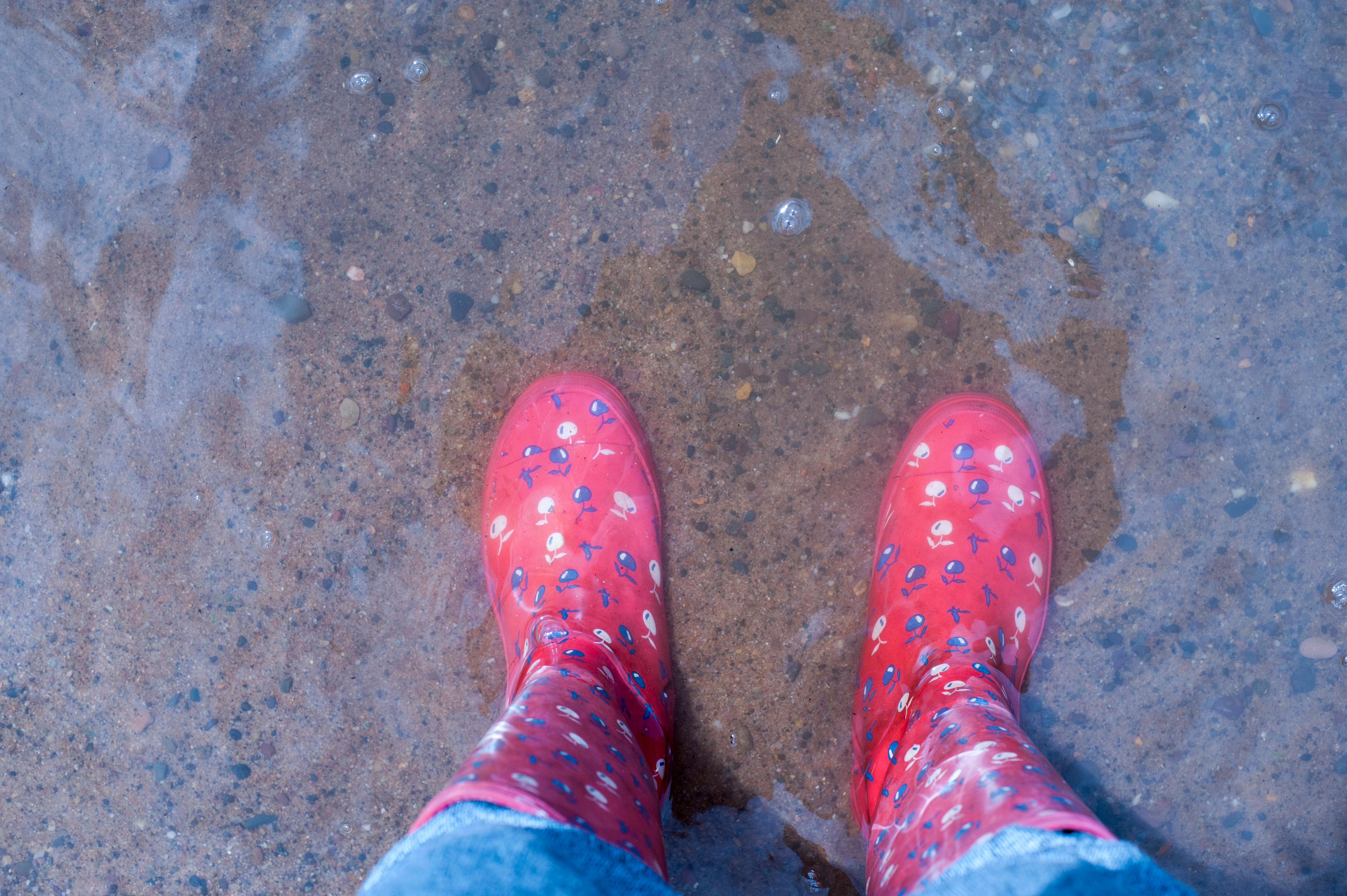 brown and blue rain boots