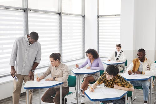 Free A Man Looking at His Students while Taking Exam Stock Photo
