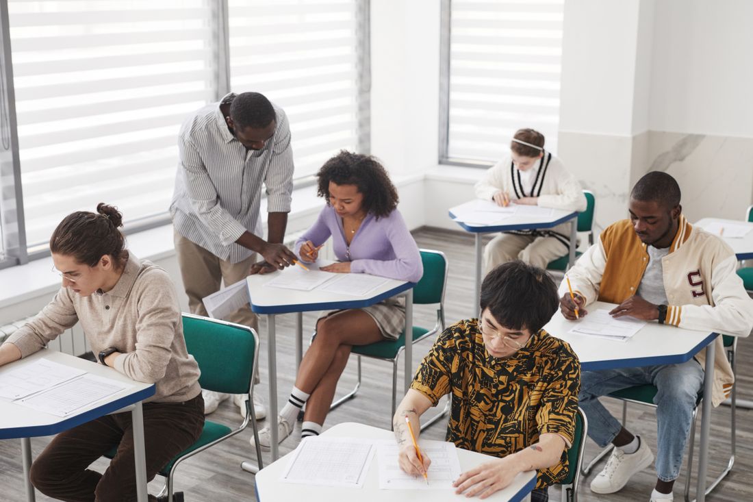 Students working at desks in a driver education classroom