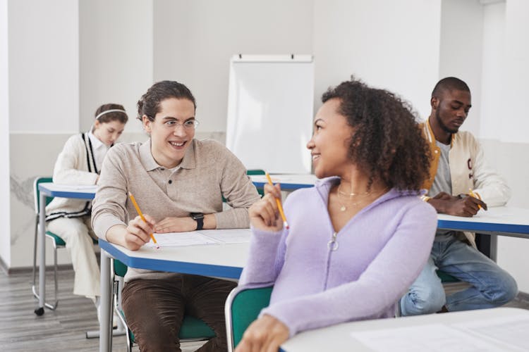 Students Sitting In The Room