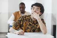 A Man Sitting at the Table