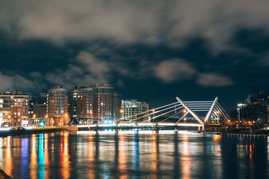 City Buildings and Bridge at Night