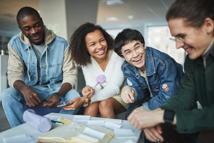 A Group Of Students Working Together