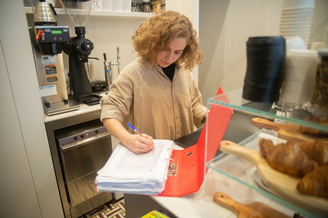 A Woman Working in a Coffee Shop