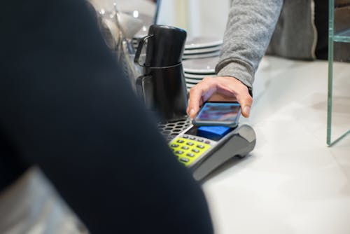 Free Cashless Transaction in a Coffee Shop Stock Photo