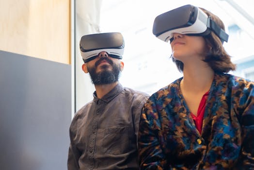 A couple wearing VR glasses explores a virtual world indoors, showcasing modern technology and lifestyle.