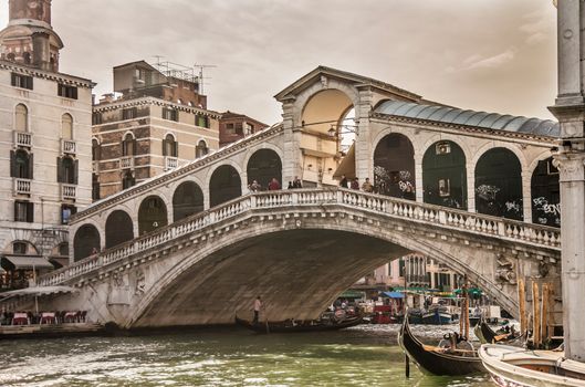 People Walking on the Bridge