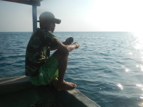 Foto profissional grátis de mar, pescador, pessoas