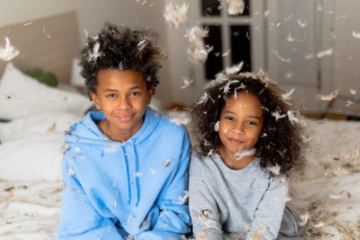 Kids Drizzled with Pillow Stuffing