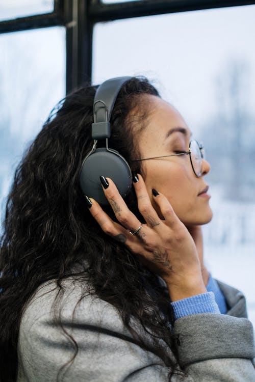 A Woman Wearing a Headphone