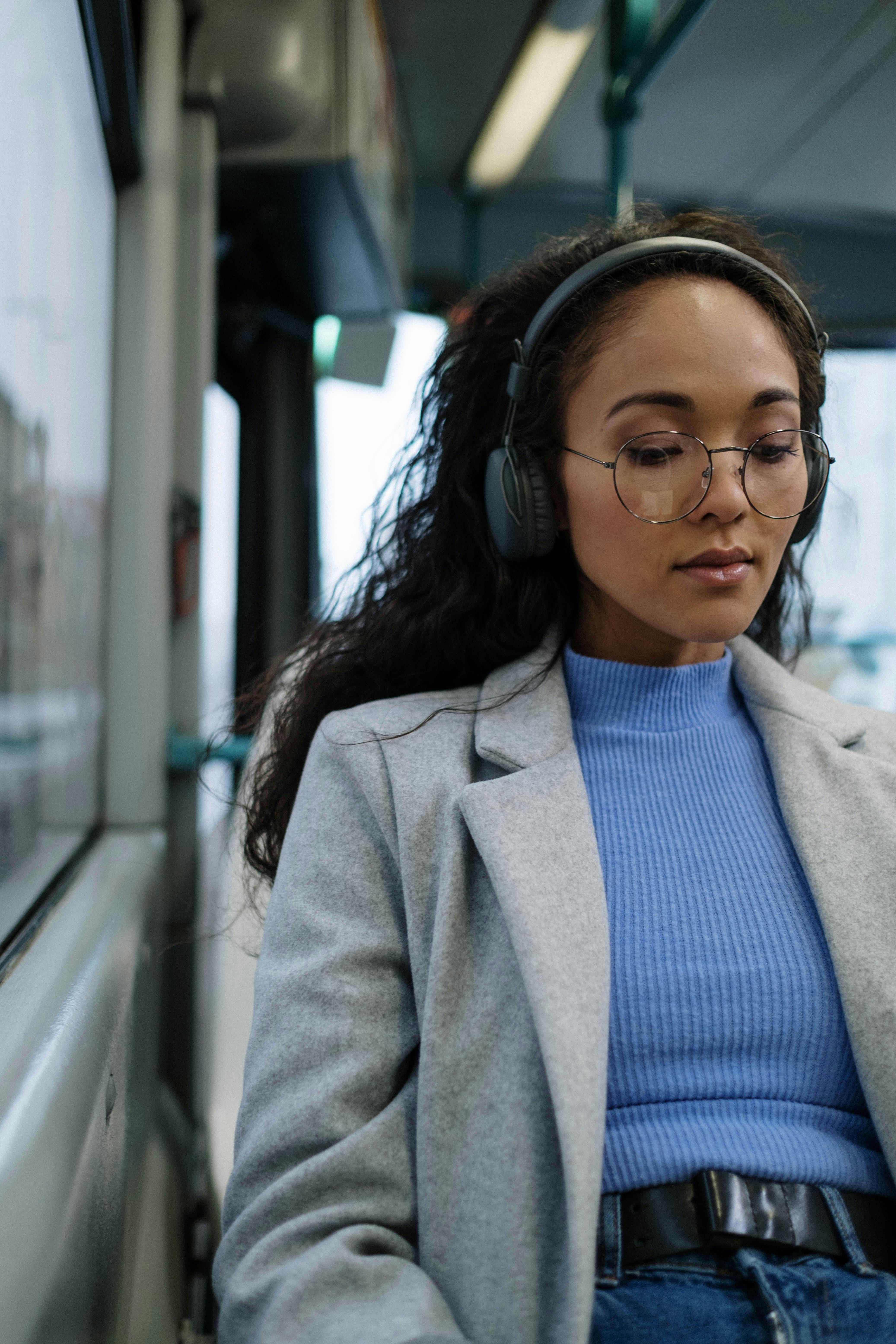 a woman wearing black headphones