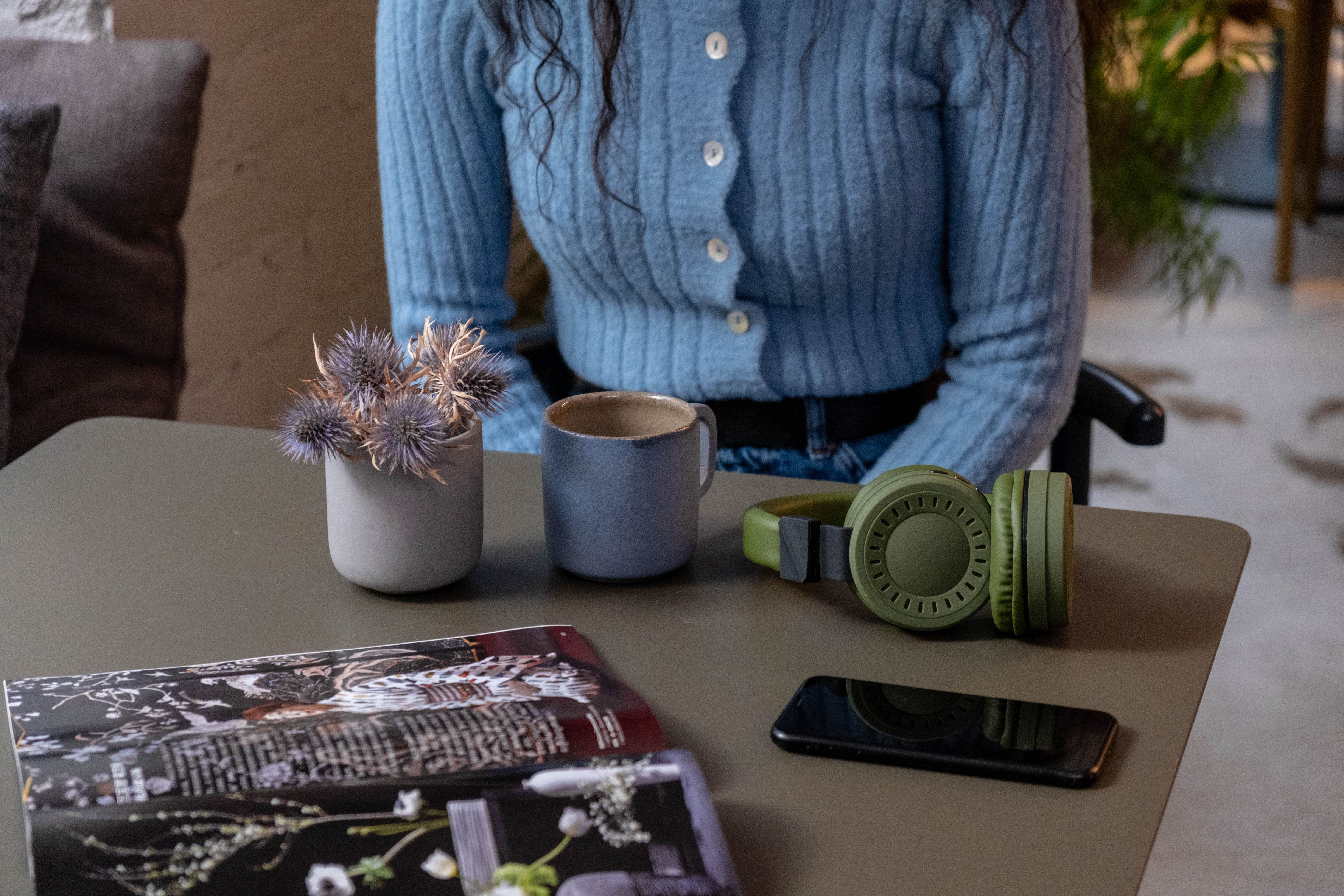 Electronic Gadgets over a Table · Free Stock Photo